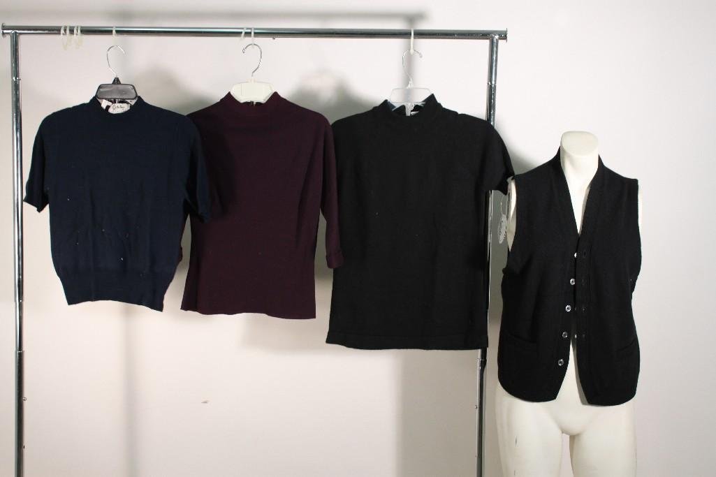 Ladies Vintage Sweaters (4): Black Talbottsweater size 36 NWT, purple Alex Colman sweater size 29 in good condition, Pebble Beach of California Lambs Wool sweatervest size medium NWT, Catalina Inc. virgin wool size 38 NWT, in goo