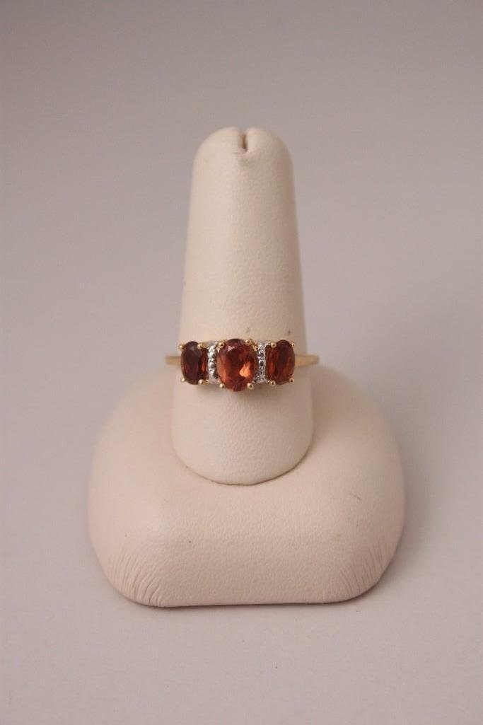 Mocha Scapula & Sterling Silver Ring: Ring marked 925, three stones, good condition, size 8.