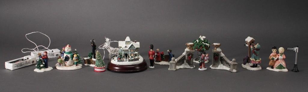 Thomas Kinkade and Other Christmas Miniature Figurines: "Victorian Lights Christmas Day" authentic issue in Thomas Kinkade's celebration of light collection sculpture no. A8064, battery operated. Figurines ranging in size from 1.5" to 3" tall. Snowman scen