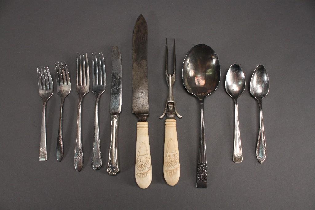 Vintage Flatware and Serving Pieces: Community silver plate serving spoon, two carved handle serving pieces, Tudor Plate forks, teaspoons, and more.