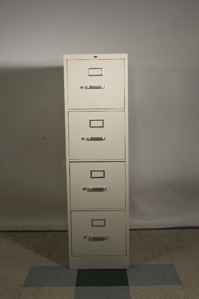 HON Metal Filing Cabinet: 4 drawers, measures 15" x 26 1/2" x 52", in good used condition,with some hanging files.