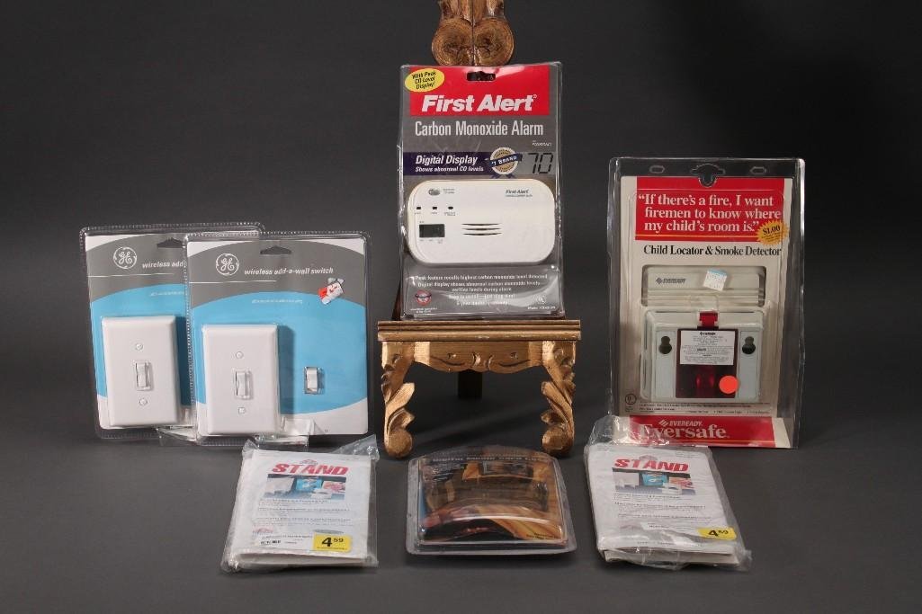Home Goods: First Alert carbon monoxide alarm, GE wireless add-a-wall switch, child locator and smoke detector, digital media card case, and more.