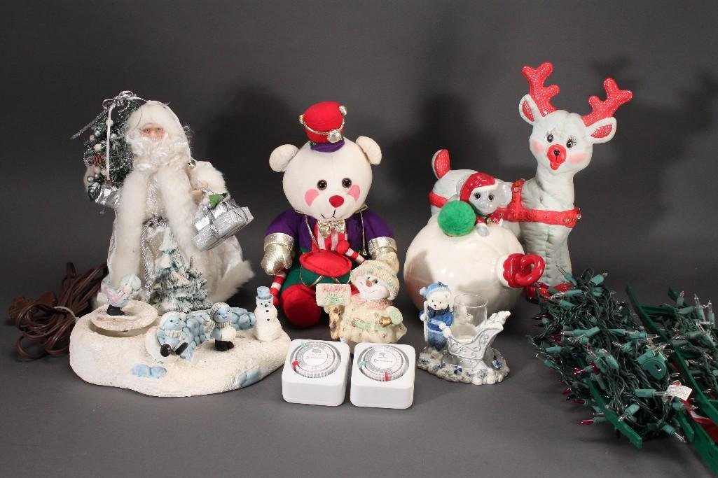 Christmas Decor: Assorted Christmas decor lot includes Christmas lights, snowman figurines, ceramic mouse on ornament figure, snow bear candle holder, santa tree topper, and much more.