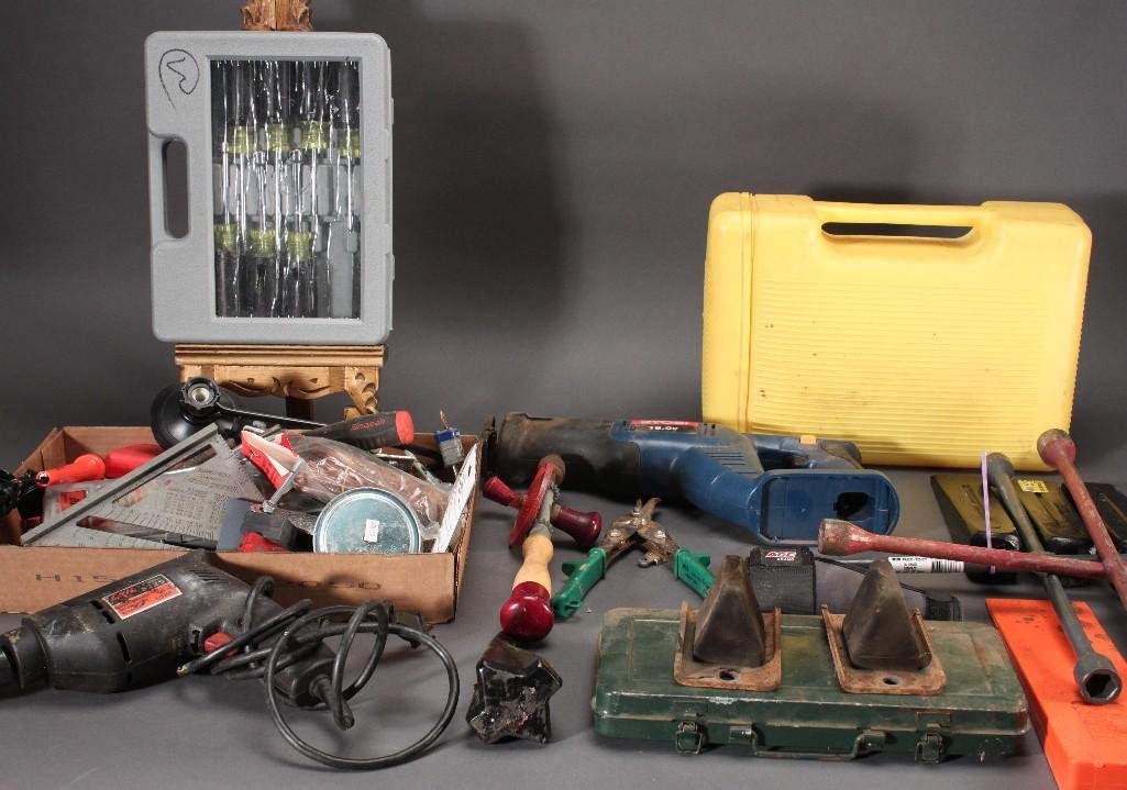 Tools and Hardware: Jumper cables, screwdriver, Master Lock, Autoshop 40 pc tool set, splitting wedge, electric saw (no battery), electric drill, and much more.