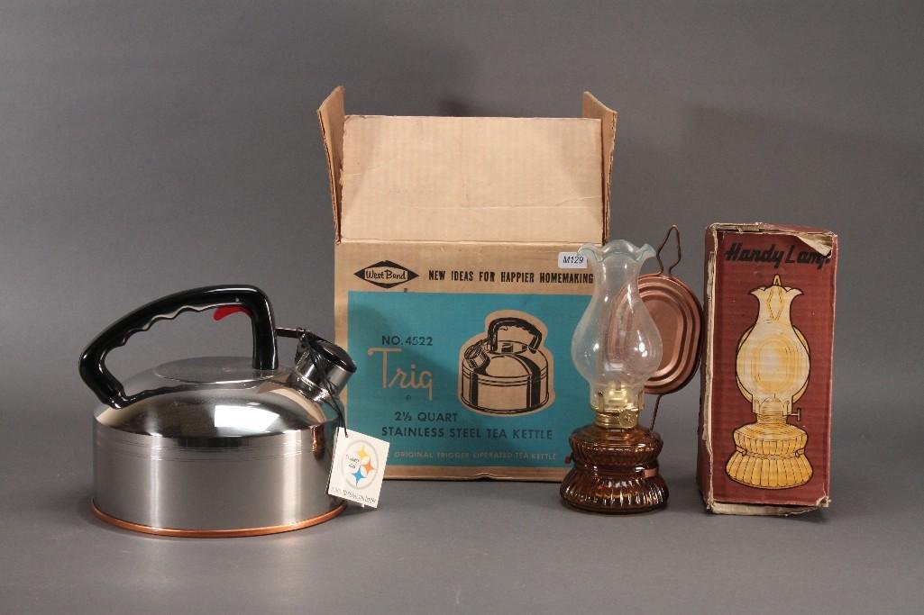 Tea Kettle and Handy Lamp (2): West Bend 2.5 quart stainless steel tea kettle and a handy lamp lantern. Both items are new in original packaging.