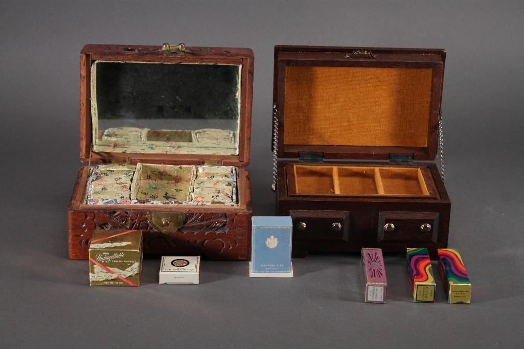 Jewelry Box And Avon Beauty Products (8): Six Avon beauty products and two wooden jewelry boxes. Two Avon Occur perfume rollers, cream sachet, Something Blue perfume, and more.