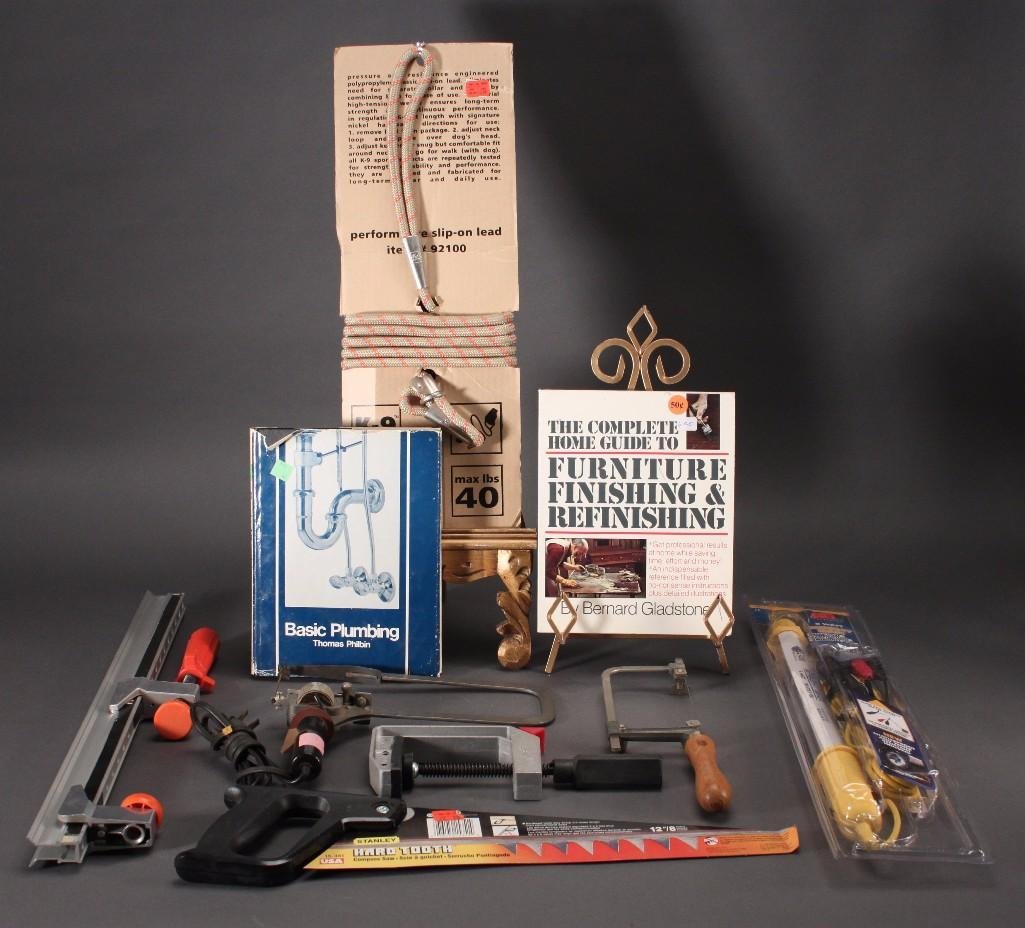 Plumbing and Home Supplies: Basic plumbing book, Stanley hard tooth compass saw, K-9 sport 40 pound capacity dog leash, Bright bar 8 watt light, c clamp, and more.