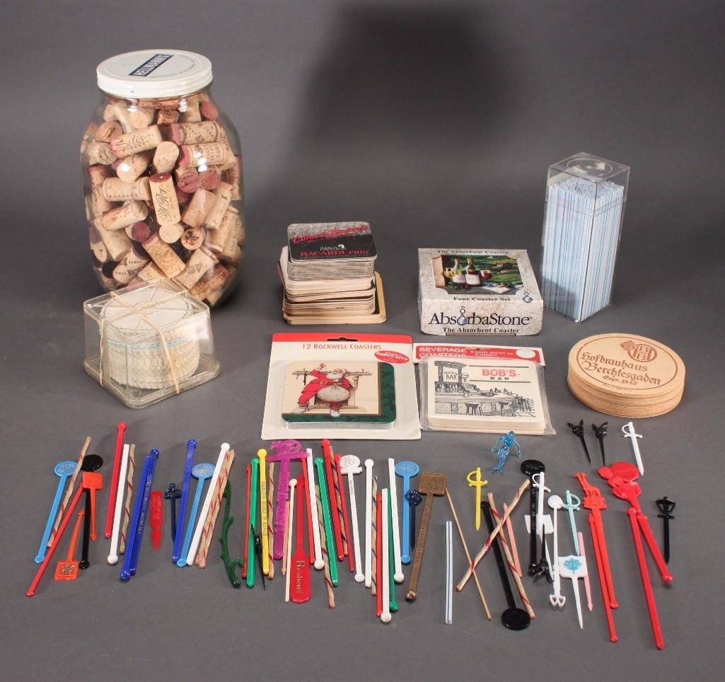 Assorted Coasters, Wine Corks, and Vintage Beverage: Jar of assorted wine corks, assorted vintage beverage stirs, The Absorbent four coaster set, and many more assorted beverage coasters.
