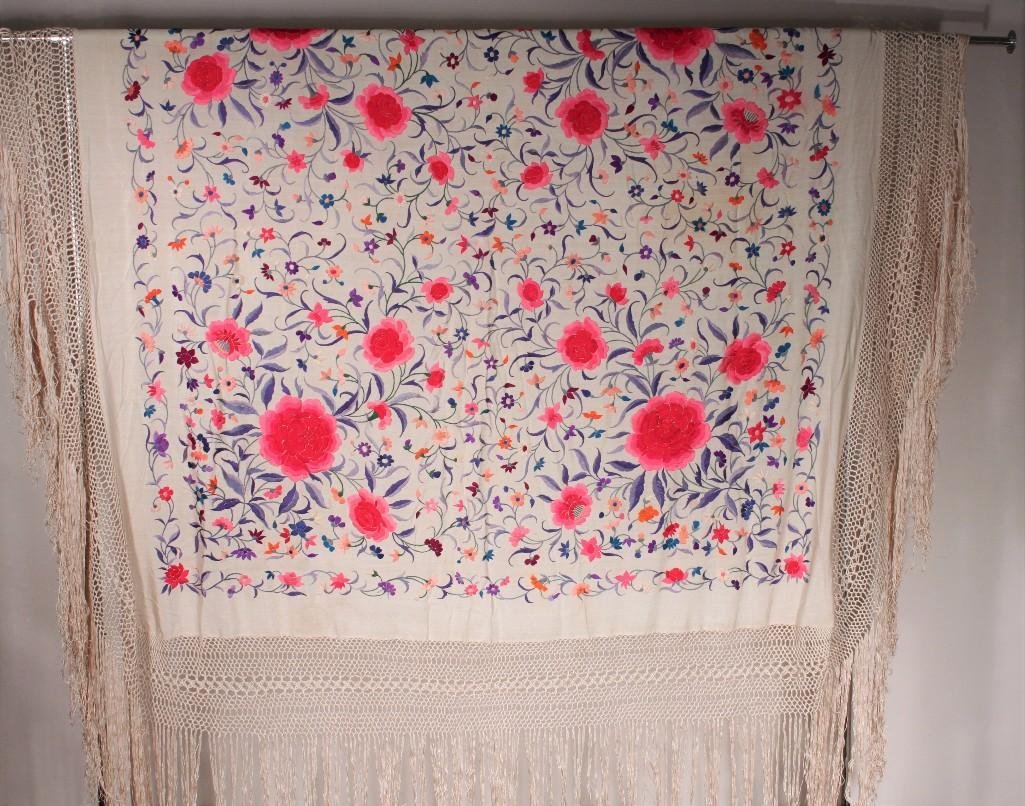 Embroidered Piano Shawl: Vibrant purples, pinks and blues, floral embroidered design, measures 66" square, tassels around edges, some spots but in good condition.