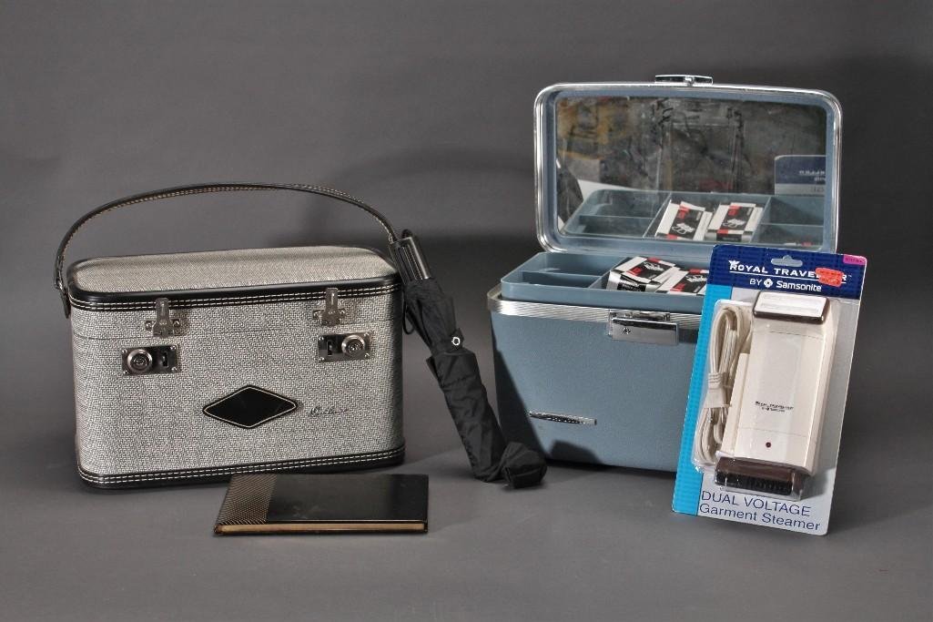 Vintage Caboodles & Accessories (5): Large lot includes; two large travelingcaboodles with handles, glove compartment umbrella, Royal Travellerby Samsonitedual voltage garment steamer and guest sign-in book.