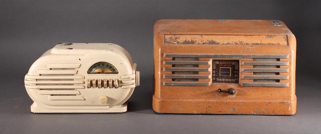 Vintage Radios (2): Off white radio, shows age and wear, brand unknown, model no 128495 B and a Amcocoin operated hotel/motel radio that shows signs ofage and wear. Both items do not work.