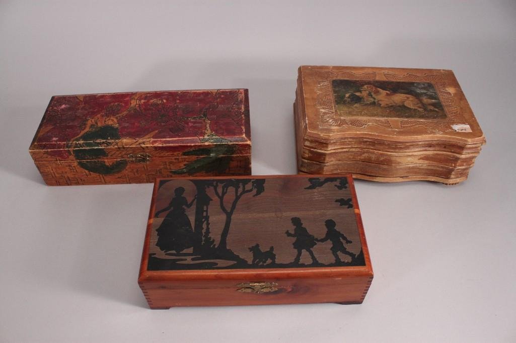 Jewelry Boxes (3): One 10.5'' long wooden jewelry box with silhouettescene on lid, one 13'' long wooden jewelry box with carved and painted flowers on lid containing vintage costume jewelry that has been re-purposedinto