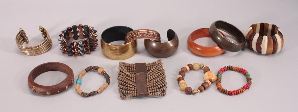 Ladies Costume Bracelets (13): Brown tone stretch bracelets, cuff bracelets, copper bracelet, and more.