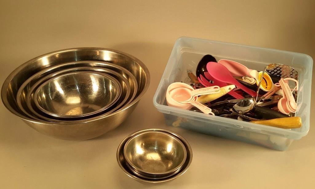 Kitchen Utensils and Mixing Bowls: Pink Kitchen Aid measuring cups, tongs, egg whisk, potato peeler, 8 stainless steel mixing bowls, ladle, spatula, forks, spoons, can and bottle opener, and much more.