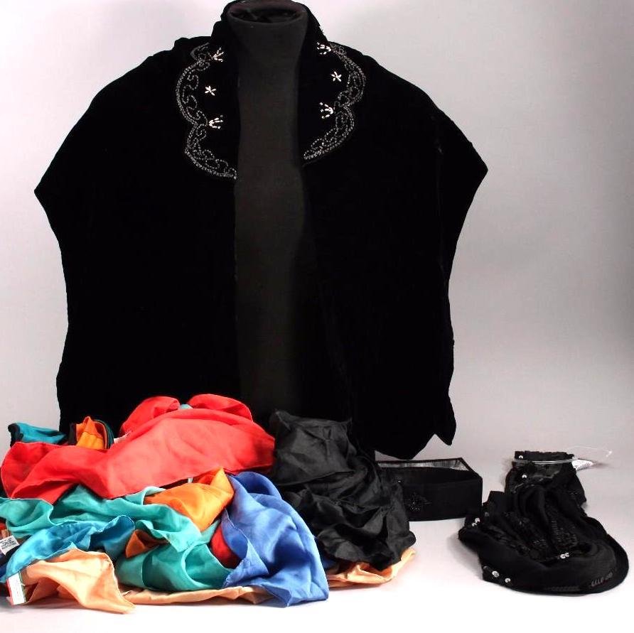 Ladies Scarves, Belts, and Cape: Large leo includes sequin black dress belt, nylon, and rayon scarves, a beadedblack cape. Scarves vary in size, texture, colors, and designs.