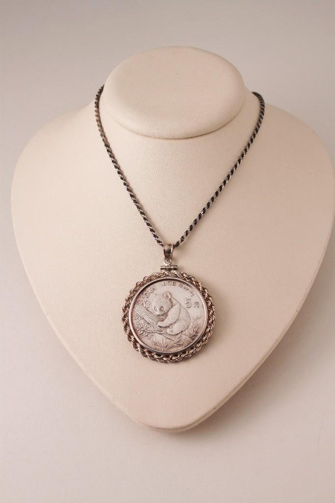 1995 Asian .999 Sterling Pendant & 925 Chain: Panda bear and Pagoda design coin marked .999 1/2oz AG framed in 925 sterling band, same design as the chain.