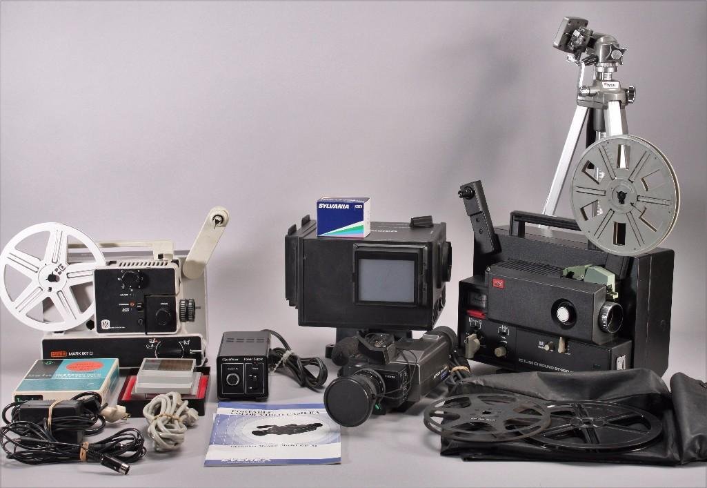 Vintage Projectors & Accessories: Quasar power supply model no KT576SE, EumigMark 607 D projector (shows age and wear, possibly missing pieces), tripod, BaiaInstasplicer eight hundred, Elmo Sound ST-600 M&O 2-Track, AmbicoFilm/Slide p
