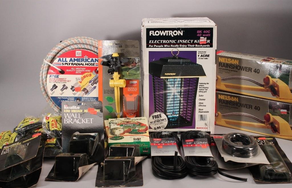 Lawn and Home Goods: Flowtronelectronic killer, two Nelson Rainshower40's, Wild Bird hanging bird feeders, 50' cables, gardening hose, and more. Items are in good condition.