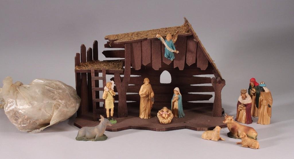 Nativity Scene (14): Includes wooden stable (10" x 7" x 18"), thirteen plastic molded figurines and animals, and "hay". Marked made in British Hong Kong. Items are in good condition for age.