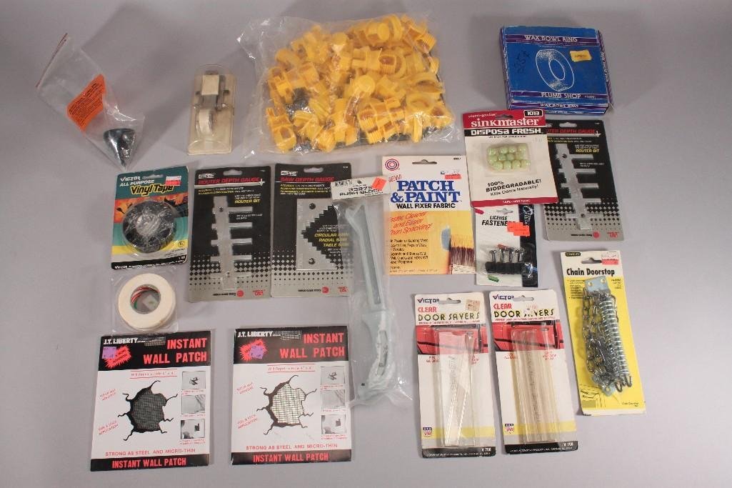 Hardware: Stanley chain door stop, wax bowl ring, all purpose vinyl tape, license fasteners, door savers, router depth gauge, wall patches, and more. Items are in good condition.