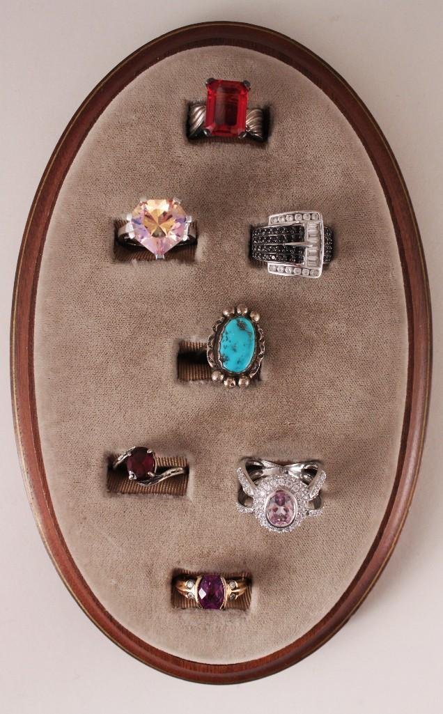 Ladies Sterling Fashion Rings (7): Sterling and gold wash sterling rings with various semiprecious and natural stones, marked 925 China.
