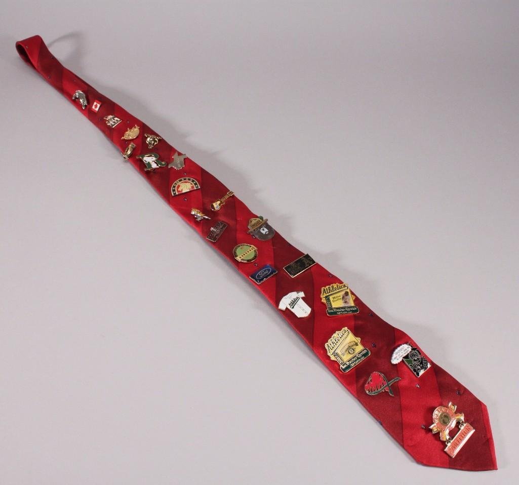 Vintage Collectible Pins: Oakland A's, Ford, Blue Note Ranch, Snoopy, Texas, Smoky Bear, Canadian pin, owl, and more; All attached to silk tie.