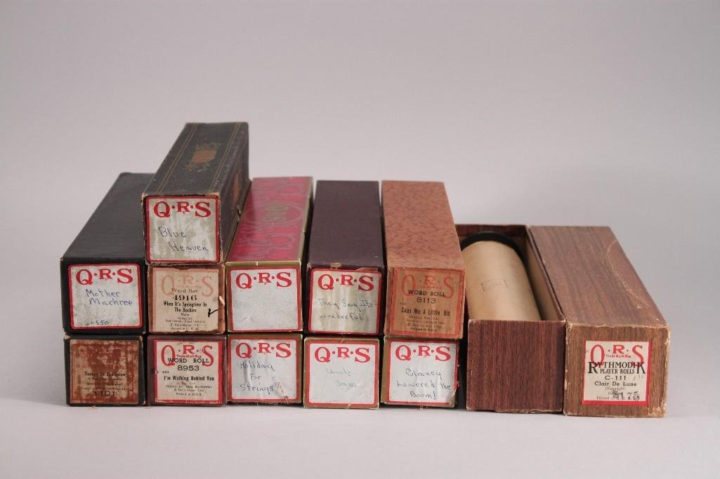 Vintage Word Player Piano Rolls (12): Titles include Clair De Lune, I'm Walking Behind You, Coax Me A Little Bit, They Say Its Wonderful, and more. Rolls are in original boxes.