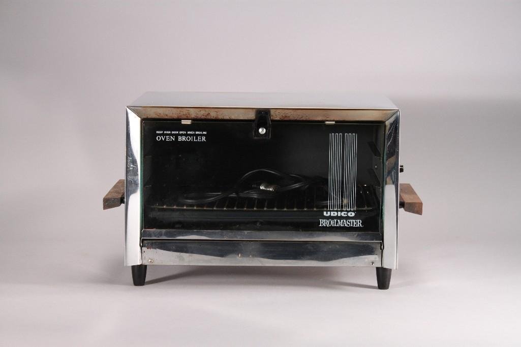 Udico Oven Broiler: Broil Master over broiler, shows age and wear, includes cord, in good pre-owned condition.