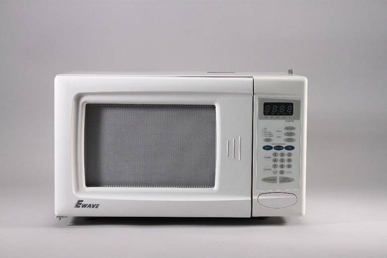 Sold at Auction: KENMORE 1000W UNDER CABINET MICROWAVE