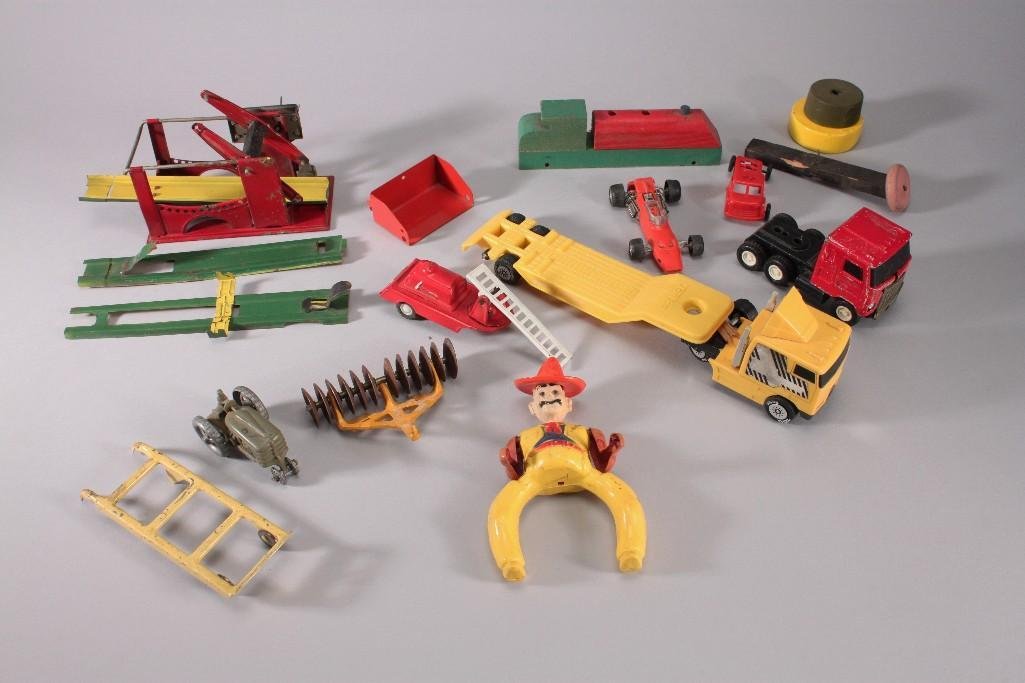 Vintage Children's Toys: Plastic, metal, and wooden toys. Toys include cars, tractors, car parts, metal Buddy L red truck, Fun Mate red racing car, Tonka truck, and more.