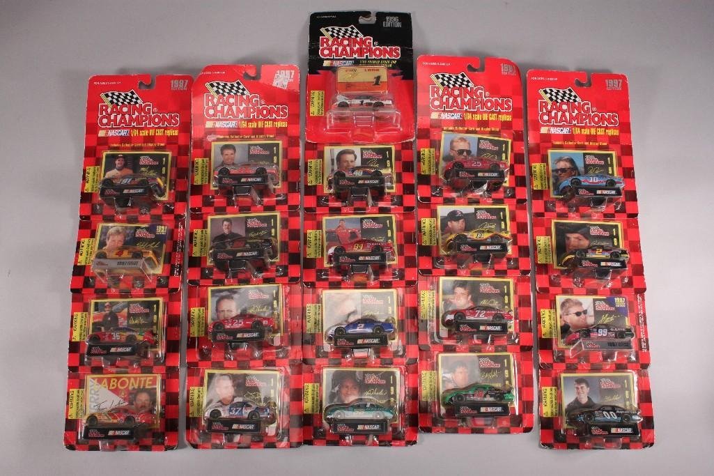 Racing Champions Cars (25): 1997 Edition, and 1996 Edition cars, cars have been stapled together in packages in groups of 5, all cars still new in original packaging.