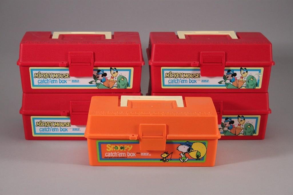 Vintage Zebco Mickey & Snoopy Boxes (5): Four Mickey Mouse catch'em boxes and one 1958 Snoopy catch'embox. All boxes are in new condition.