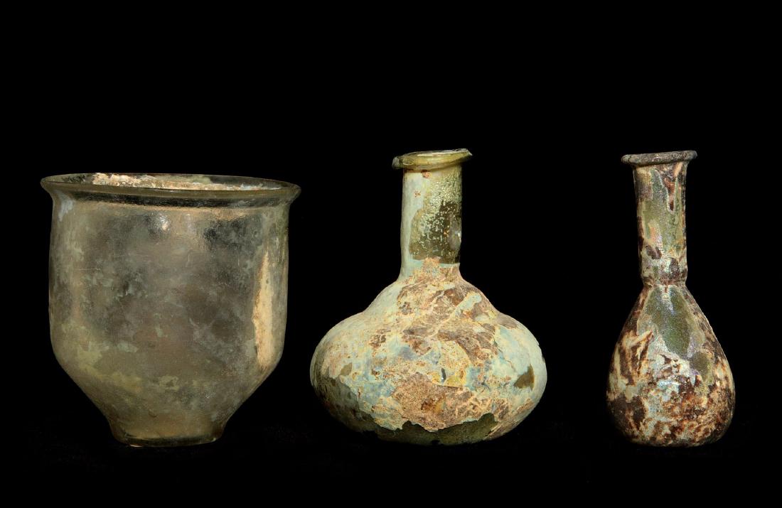 THREE ANCIENT ROMAN GLASS TYPE VESSELS (1 of 9)