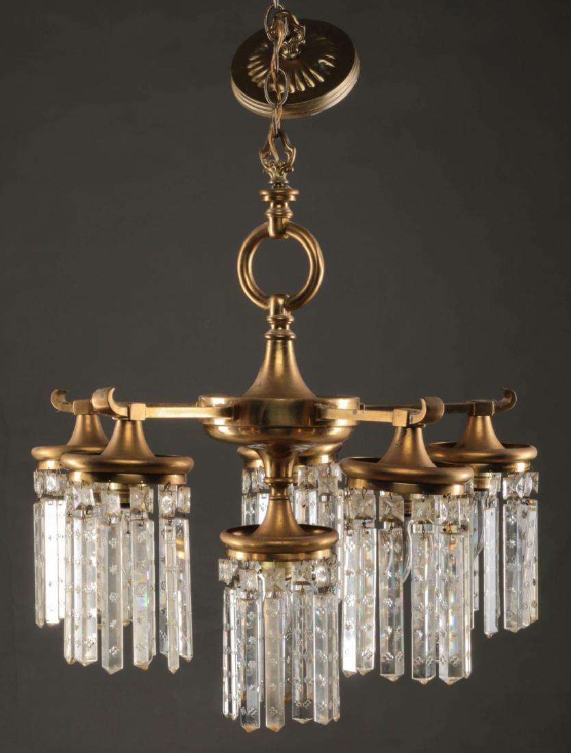 A FOUR ARM PRISM DRESSED BRASS CHANDELIER C.1920 (1 of 6)