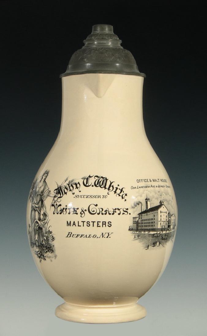 JOHN WHITE MALTSTERS BREWERY PRE-PROHIBITION STEIN: A Villeroy and Boch 3 liter stoneware master stein with pewter lid,the interior glazed in white bristol glaze, the exterior decorated in paint under glaze technique with an allegory of the harvest sta