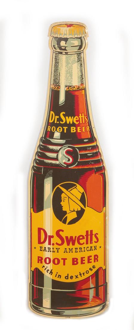 A GOOD DR. SWETTS ROOT BEER DIE CUT BOTTLE SIGN: A nice new old stock die cut tin sign for Dr. Swetts Root Beer, a bottle form flat sign circa late 1940s. Measures 44.5 x 12.25 inches. We happily provide seamless in-house packing and shipping servic