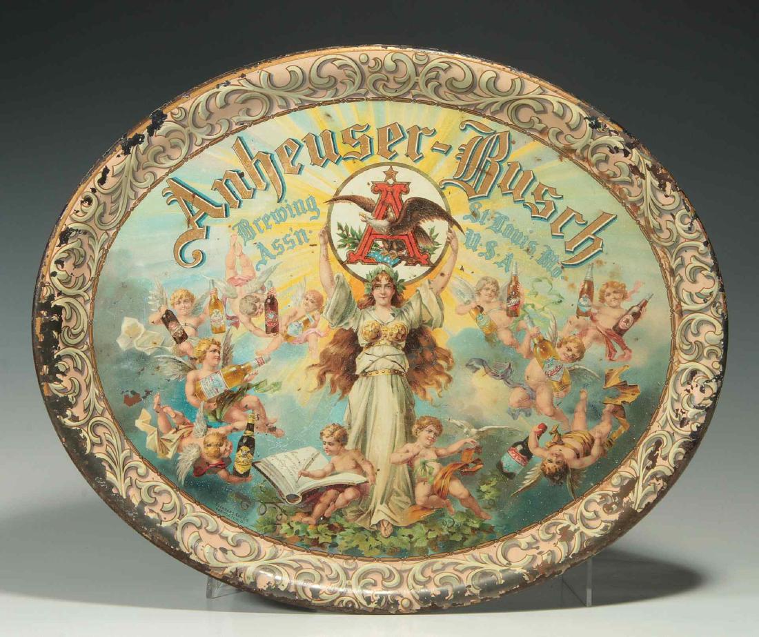 PRE-PROHIBITION ANHEUSER BUSCH BREWING ASS'N TRAY: The cherub tray with all of the Anheuser Busch products of the day being held aloft by cherubs surrounding a Columbia like figure supporting the company logo. Measures 13.75 x 16.75 inches. We happily