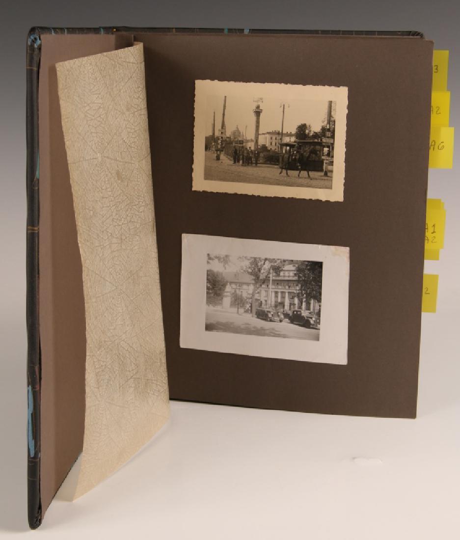 WWII GERMAN PHOTOGRAPH ALBUM, EASTERN FRONT: Approximately 93 photographs, lots of great candid and battle shots, interesting shots of German ersatz direction board signs in an unidentified Soviet town. photographs in good condition, could be a 
