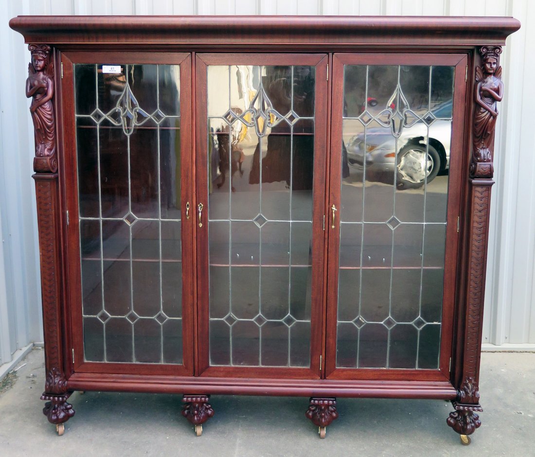 A MAHOGANY WINGED LADY BOOKCASE WITH LEADED GLASS DOORS (1 of 6)