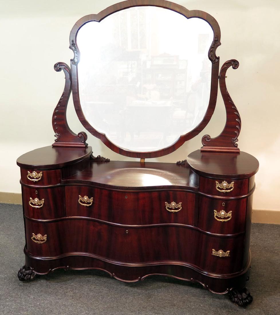 AN OUTSTANDING DOUBLE SERPENTINE MAHOGANY DRESSER (1 of 9)