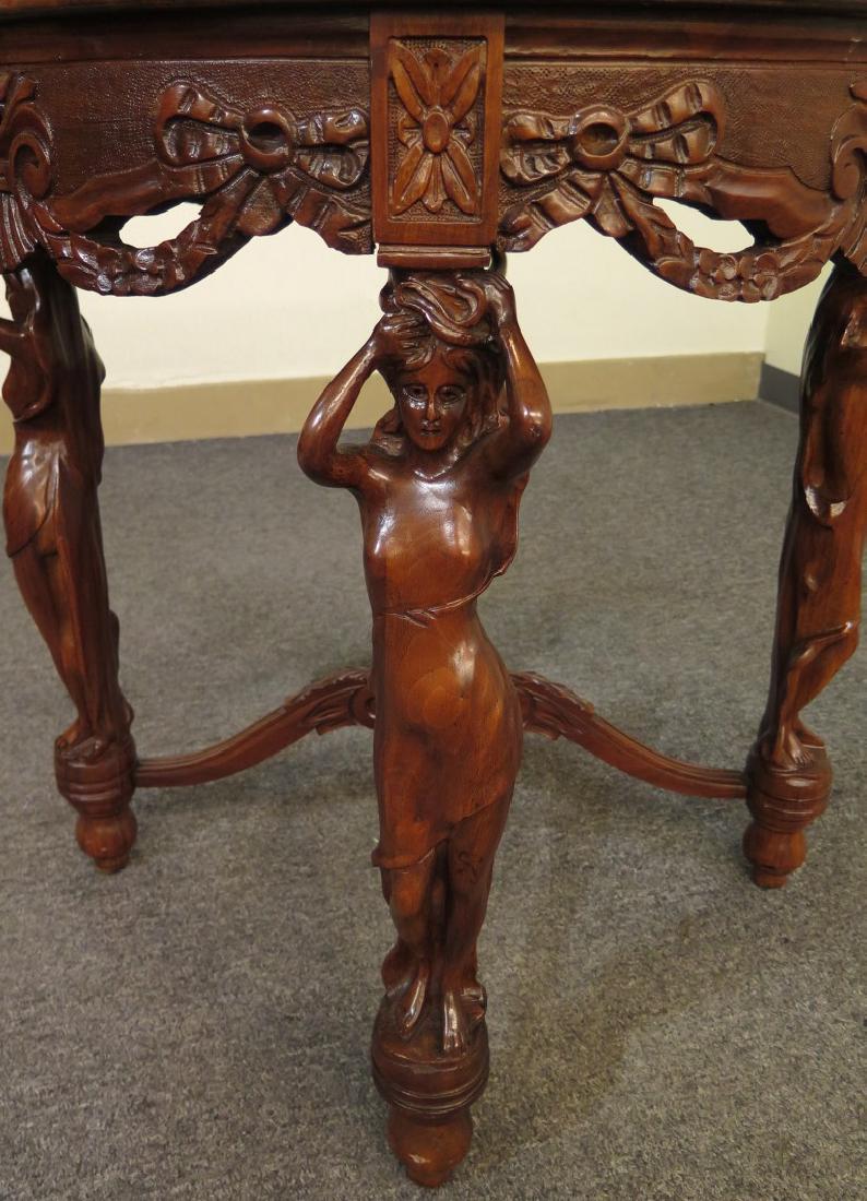 A BURLED ACACIA SIDE TABLE WITH CARVED FIGURES (1 of 6)