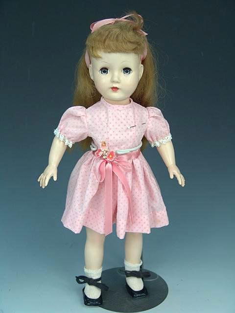 1952 EFFANBEE HONEY WALKER HARD PLASTIC DOLL: Measures 14 inches tall, good walking condition.