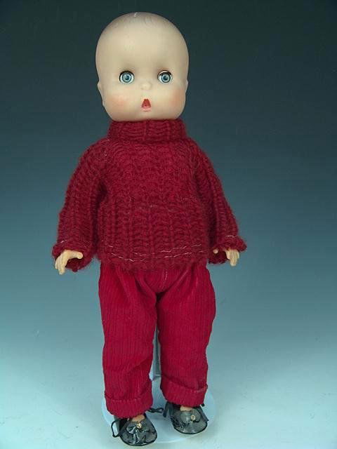 1960 IMP DOLL BY JOLLY TOYS: 14 inch vinyl doll with sleep eyes, jointed, good condition.