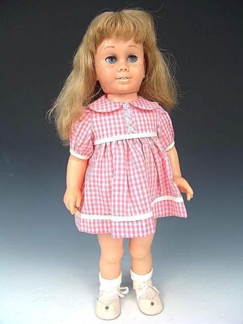 1962 CANADIAN PATENT CHATTY CATHY DOLL: Blone hair, blue eyes, full freckles and eyebrows with one lazy sleep eye. No voice string attached 19 inches