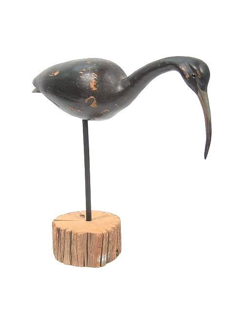 CARVED WOOD SHORE BIRD DECOY BY ROBERT GUGE: Signed and dated on the underside of the base. Very nice work. Measures 15 inches high on a 6 inch round base
