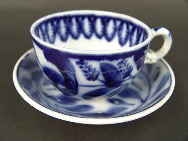 CABBAGE PATTERN FLOW BLUE CUP & SAUCER SET: Very good condition- no chips, cracks or repairs.