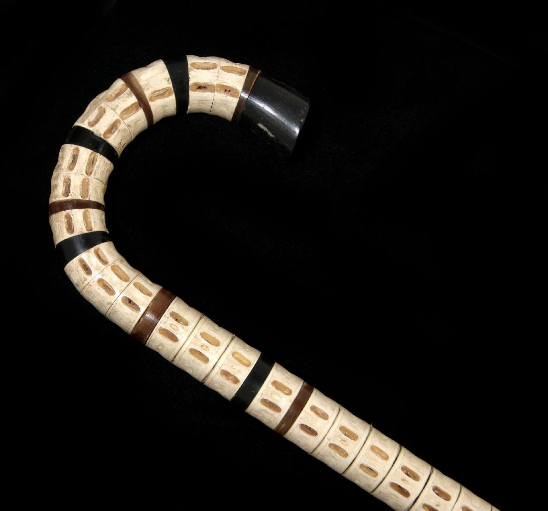 A 19TH CENTURY VERTEBRAE AND BALEEN WALKING CANE (1 of 10)