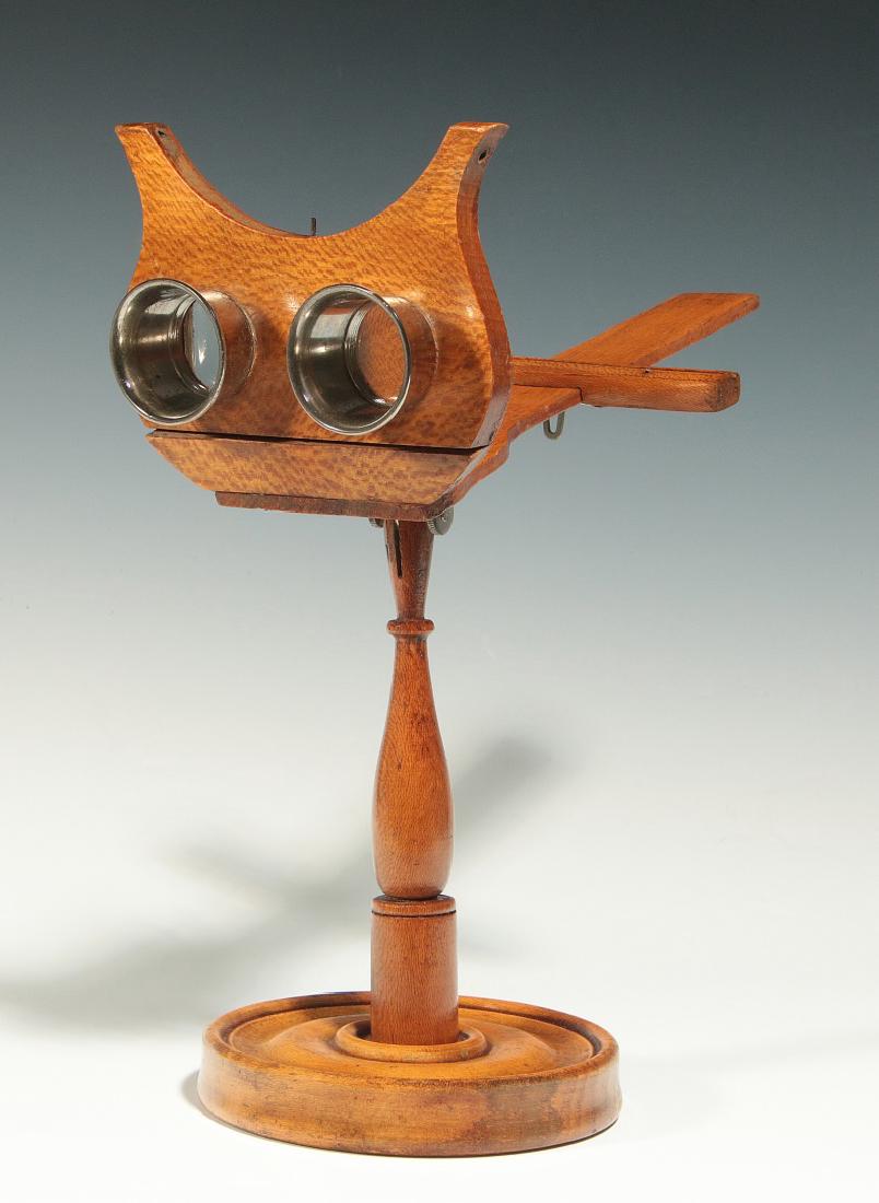 AN UNUSUAL 'OWL'S HEAD' SHAPE TABLETOP STEREOSCOPE (1 of 9)