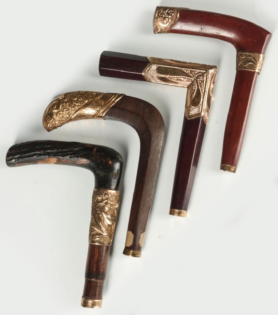 FOUR ANTIQUE CANE HANDLES WITH GOLD FILLED MOUNTS (1 of 9)