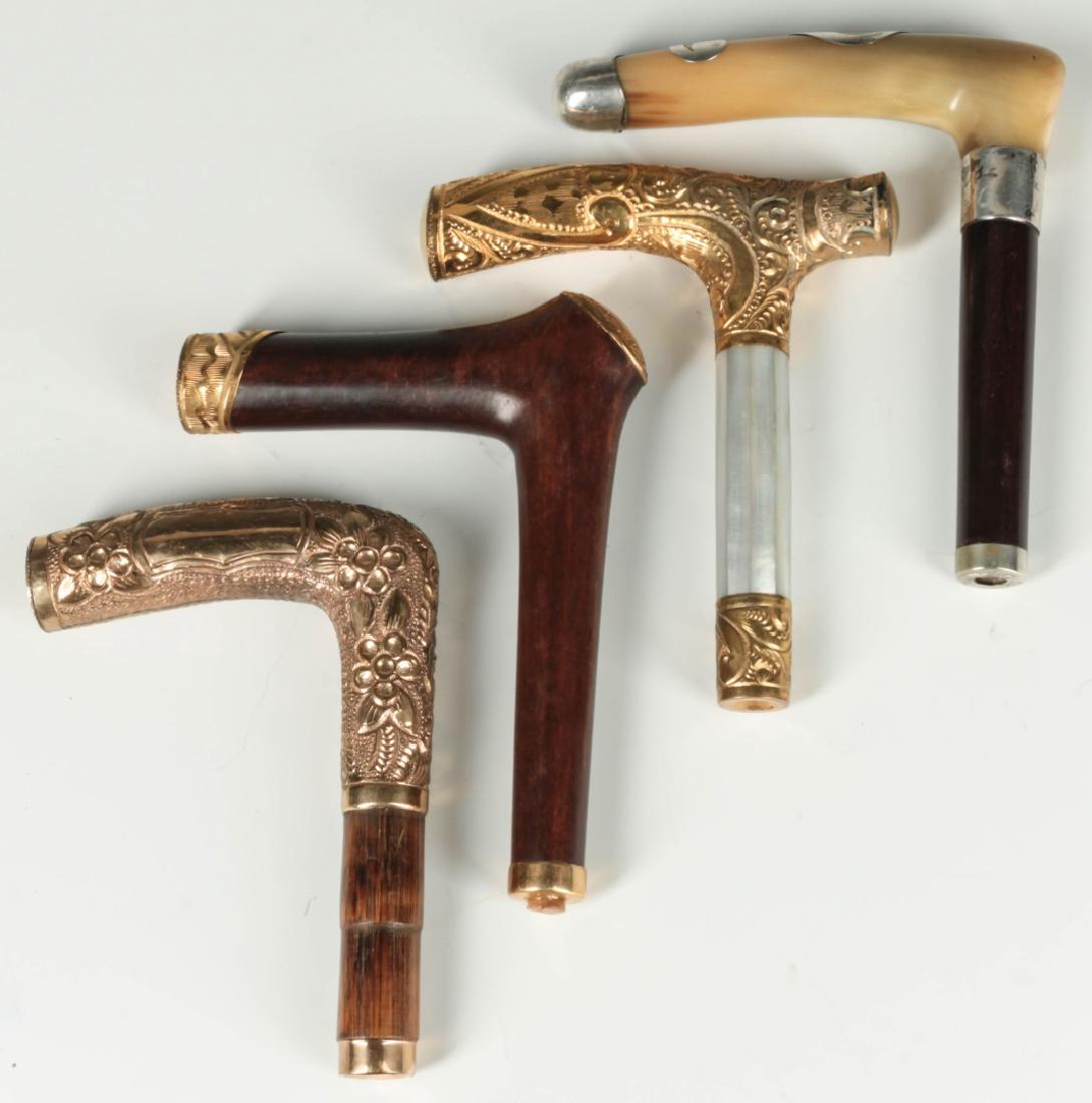 FOUR ANTIQUE CANE HANDLES WITH GOLD FILLED MOUNTS (1 of 10)